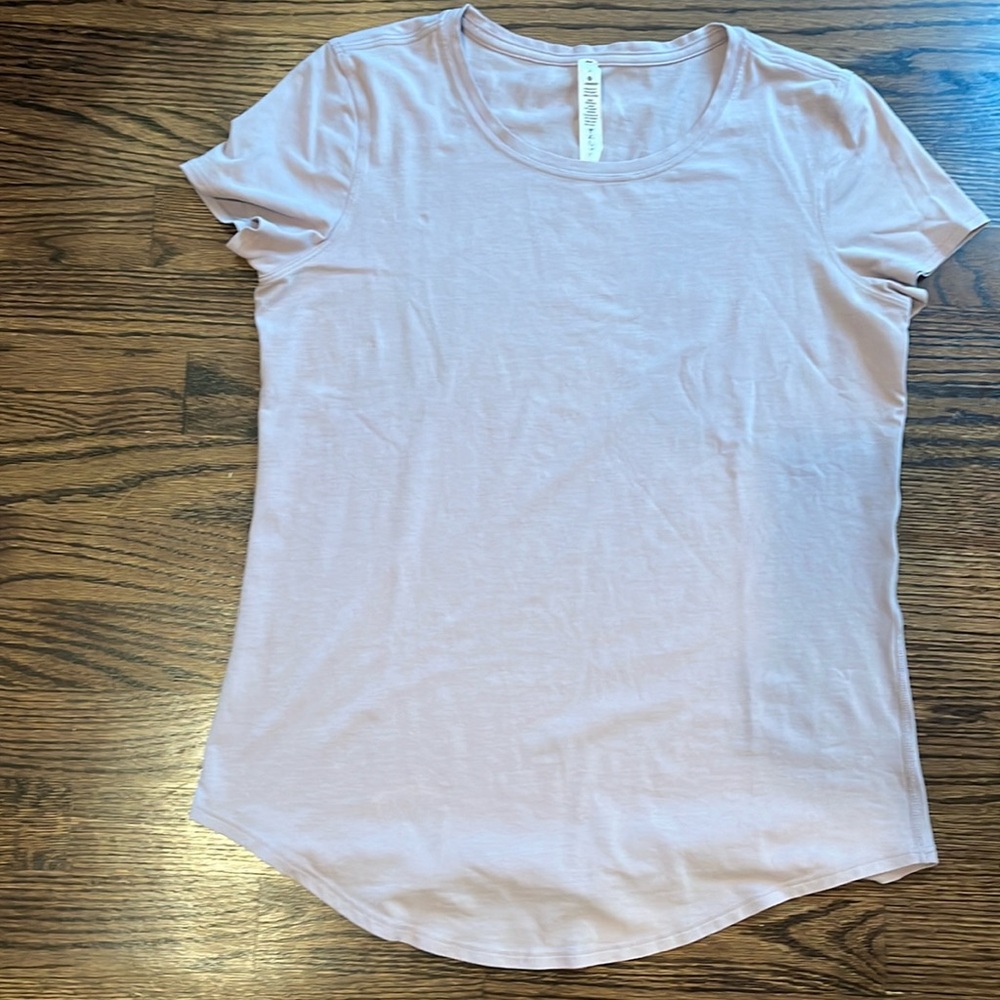 Lululemon Woman’s Dusty Rose color Short T-shirt size 4